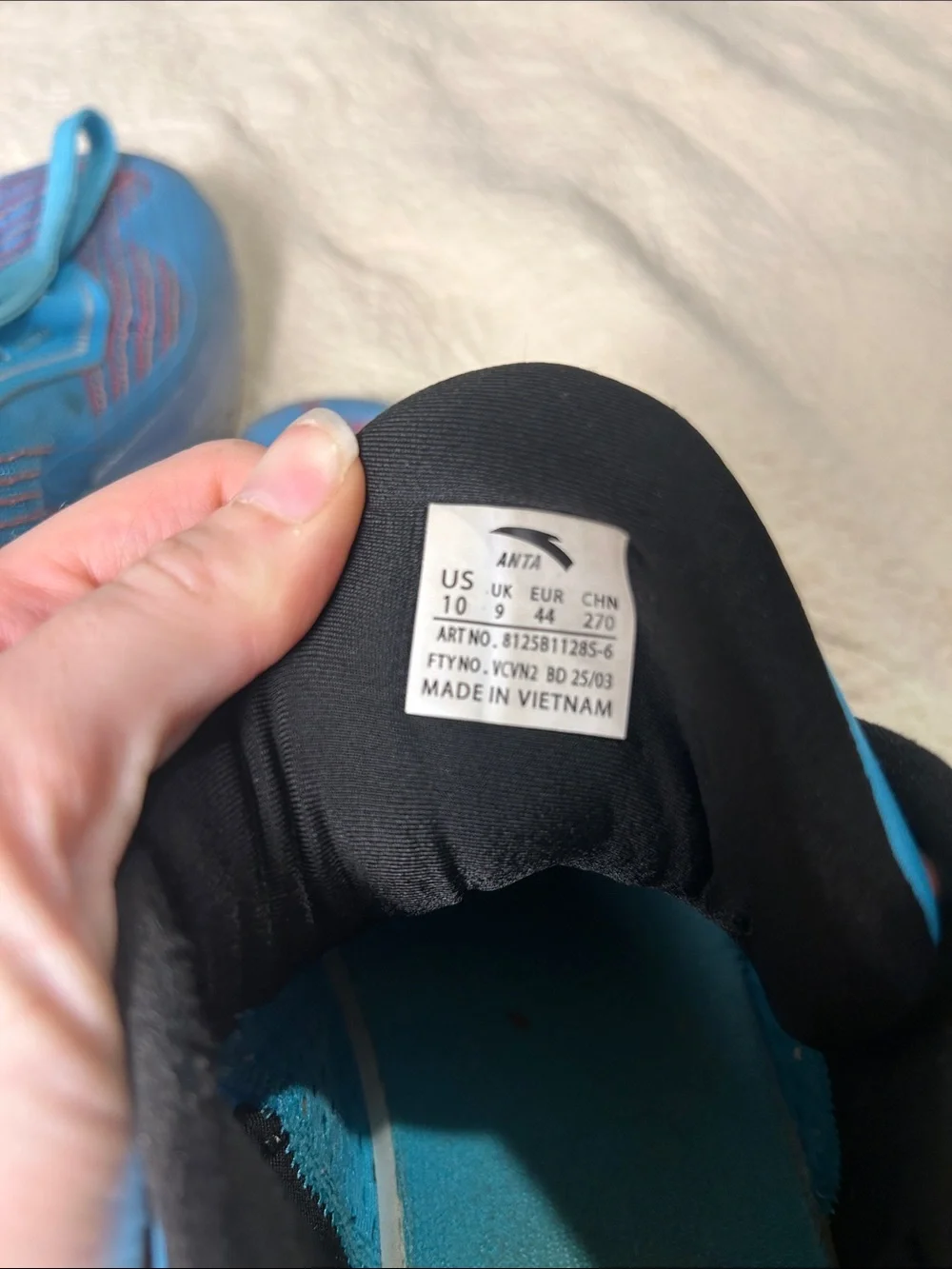 Men’s ANTA Athletic Shoes in Turquoise with Orange Accents